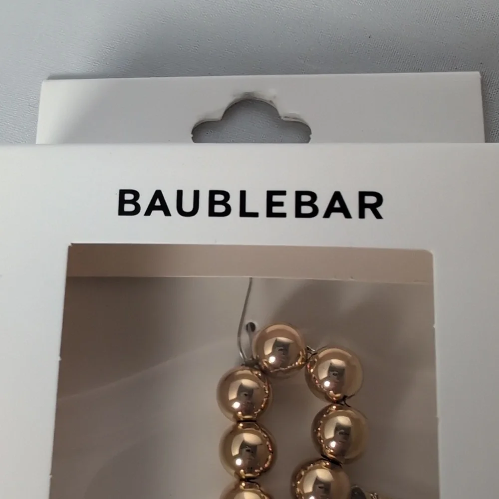 BaubleBar Champagne Celebration Themed Phone Charm Wristlet Gold Tone & Crystal